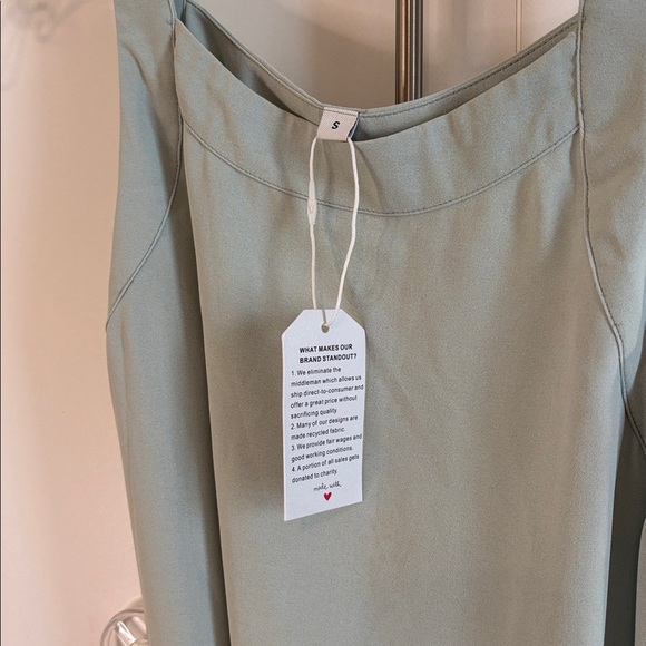 Elegant Mint / Light Green Sleeveless Dress with Front Wrap & Pockets - Picture 2 of 8